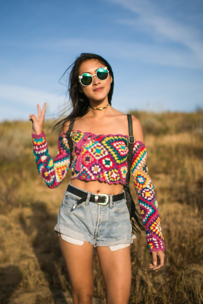 woman wearing Spell Carnaby Crochet Top Festival Style for her Coachella Outfits