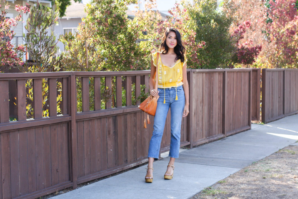 Amy Zhang wearing yellow top and Topshop Cropped Flares