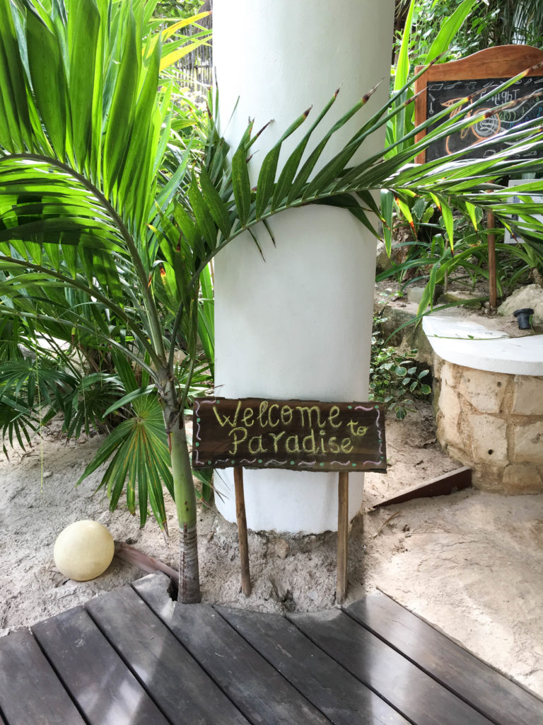 welcome to paradise sign