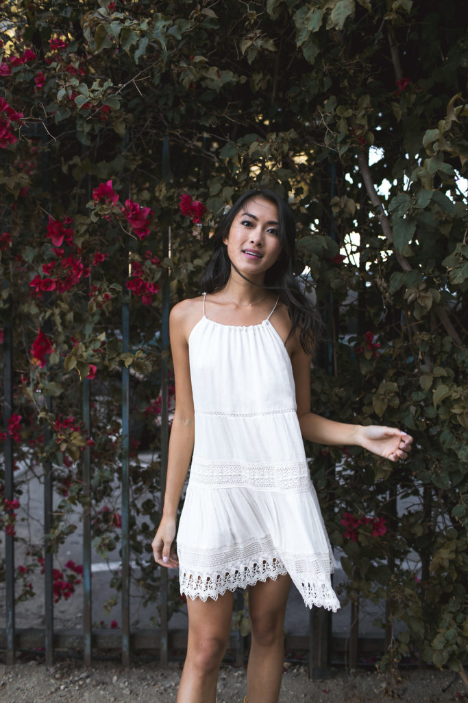 Amy Zhang of the Luxi Look wearing Urban Outfitters White Dress one of the best Summer Dresses