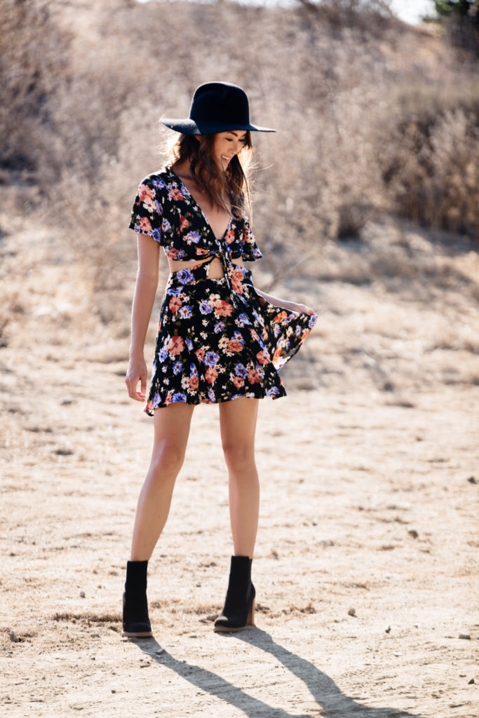 The Luxi Look wearing Forever 21 Cutout Dress, black hat, and black boots and sharing her current favorites