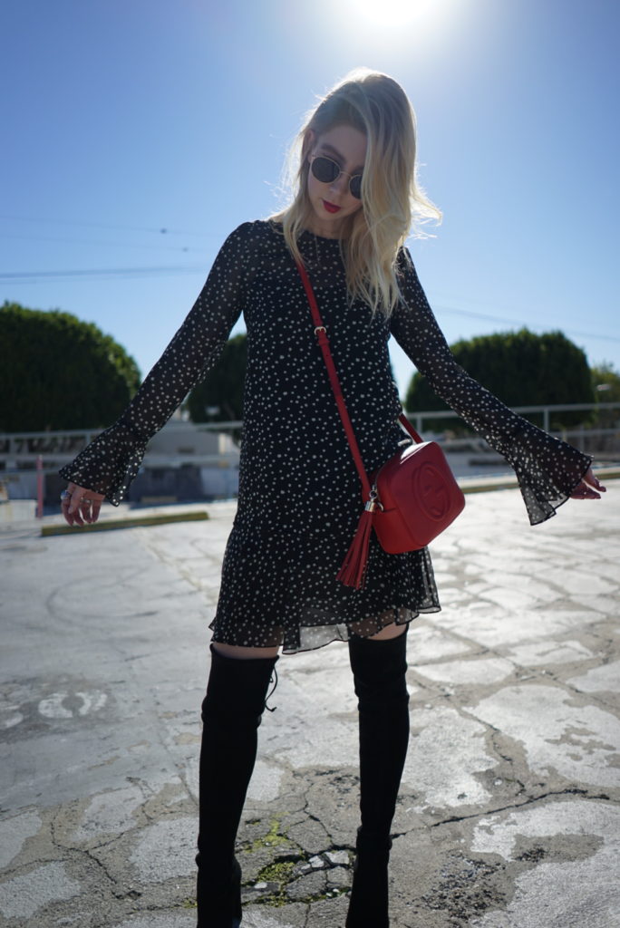 woman wearing polka dot dress